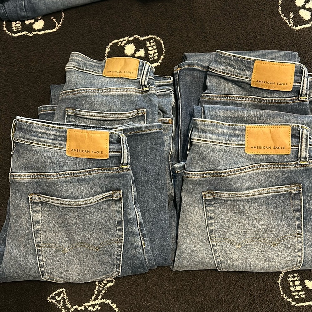 4 pair American Eagle Boot Cut Jeans